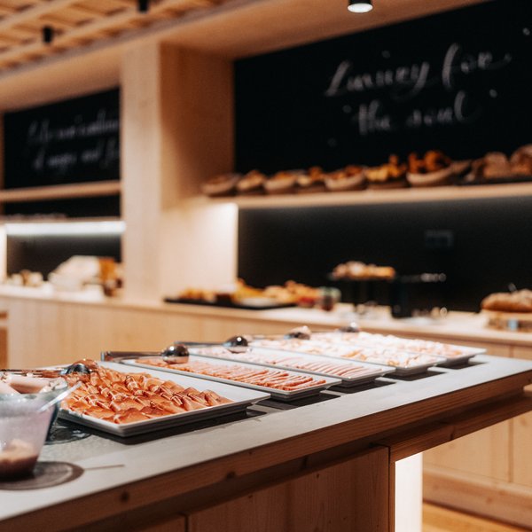 Sensoria Dolomites – Luxury for the Soul Buffet with assorted appetizers in modern restaurant setting